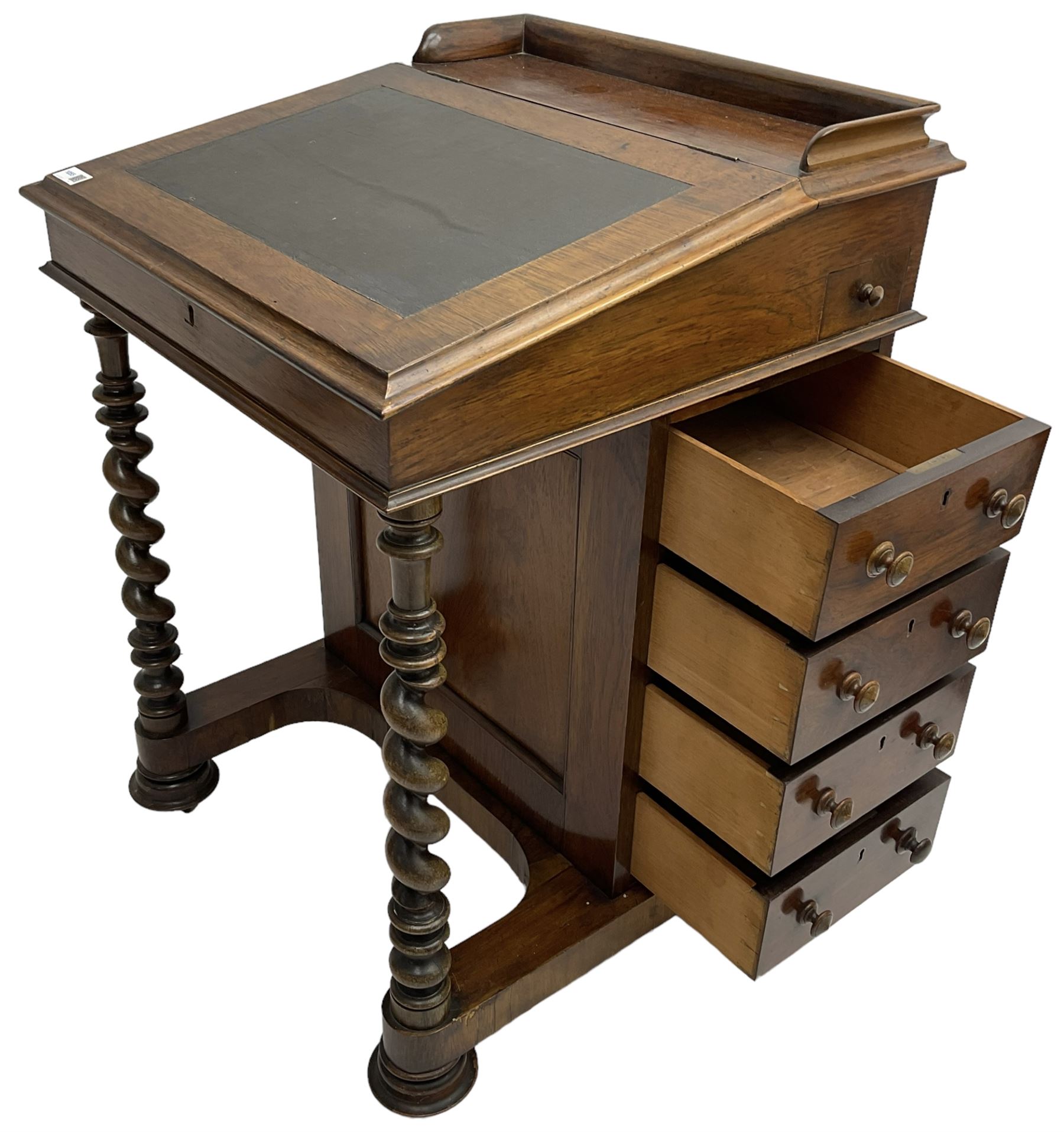 Victorian walnut Davenport, hinged sloping top with inset leather writing surface, enclosing satinwood lined interior with two drawers over faux drawer, fitted with inkwell drawer and pen compartment to the side over four drawers with an opposing false set, raised on spiral turned supports united by a shaped platform base