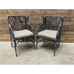 Richard Bawden (1936-2024): Pair of Cat design painted cast iron garden armchairs