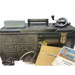 Two Singer sewing machines, model numbers 527 and 457, together with various Singer sewing machine parts, and a selection of sewing related accessories, to include threads, sewing needles, etc. 