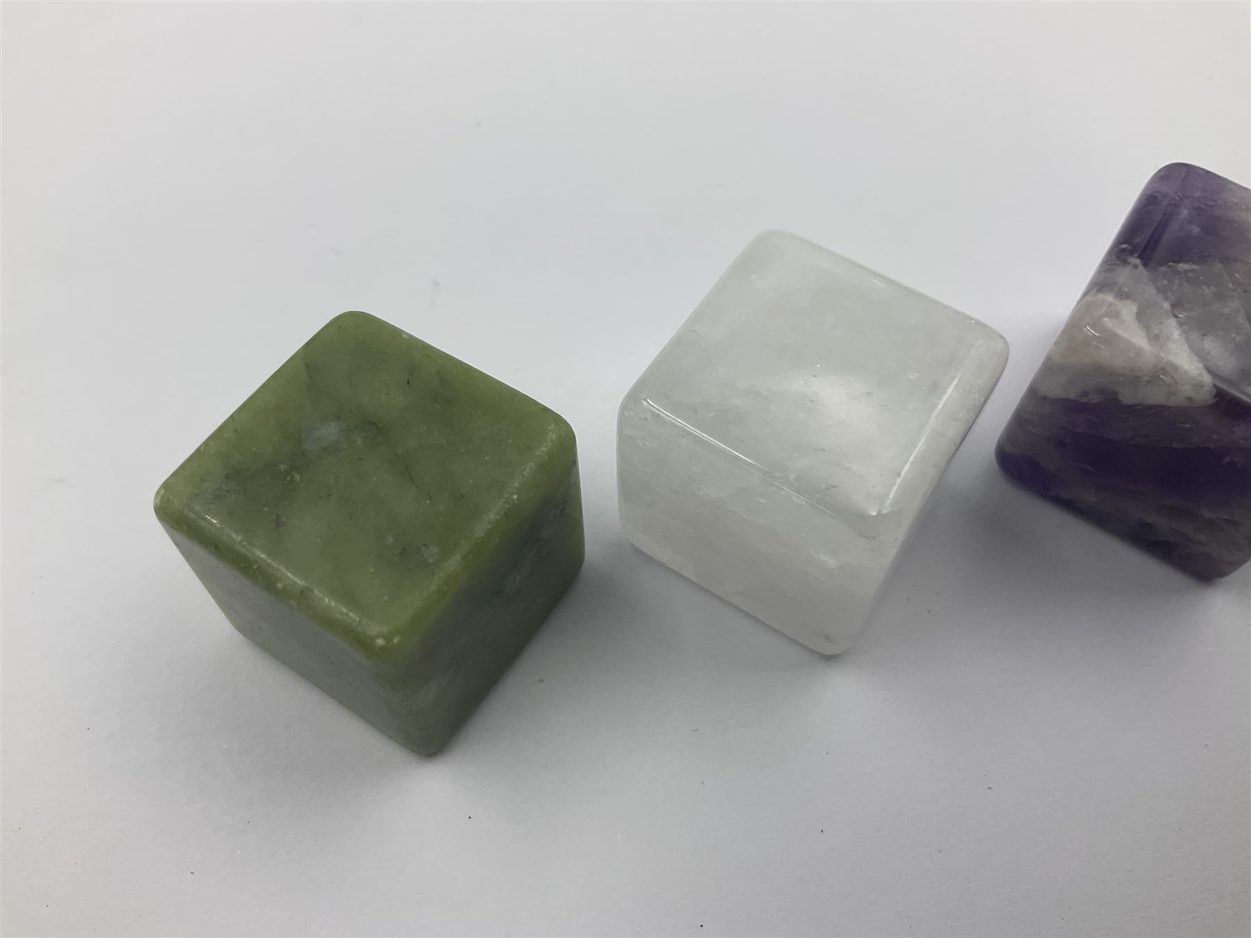 Fifteen cube mineral specimens, each cut and polished to highlight natural formations, including tiger eye, black obsidian, green aventurine, rose quartz, opalite, rhodonite etc, H2cm 