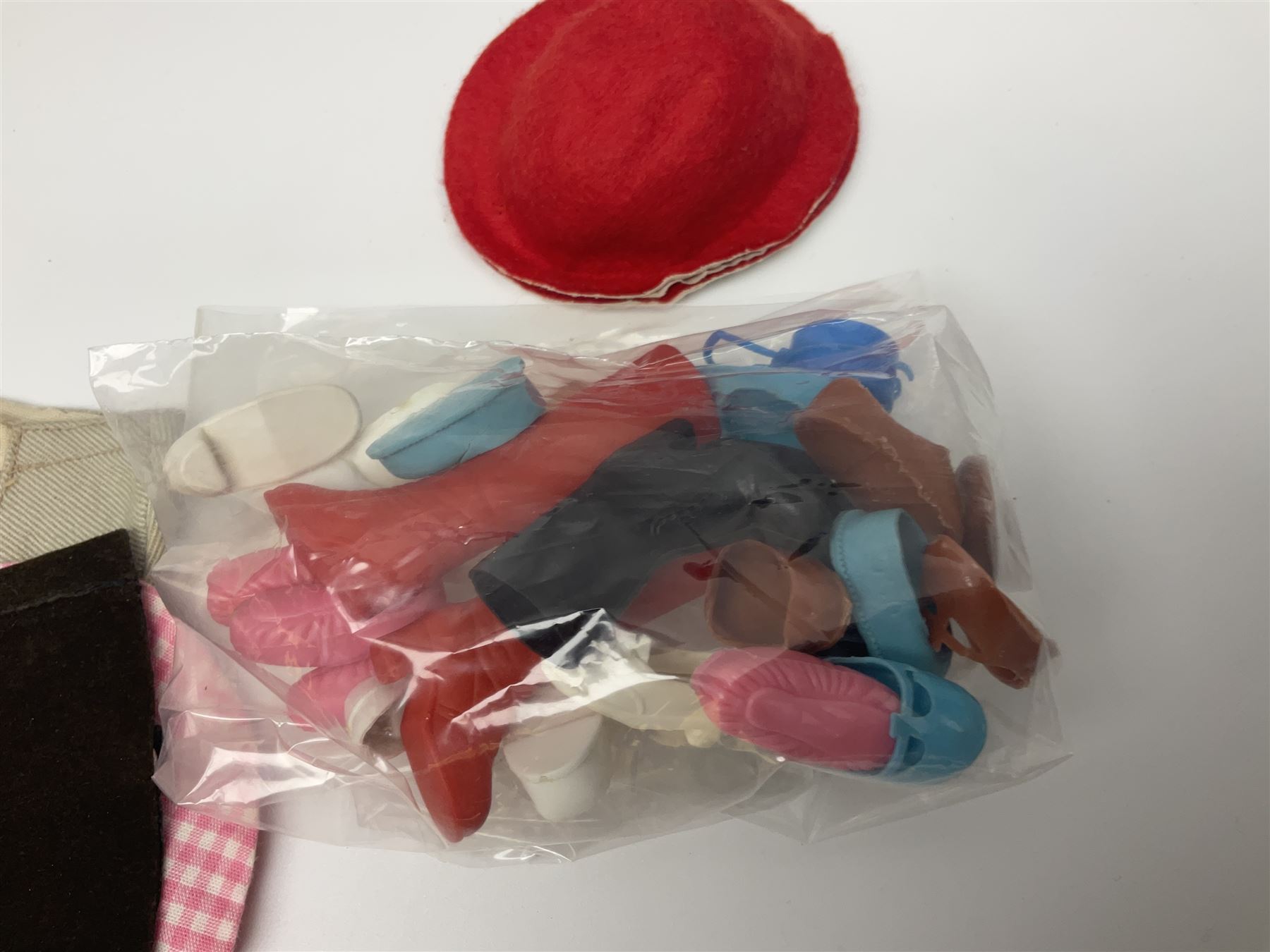 Six fashion dolls by Amanda Jane, Sindy and Barbie with various outfits, clothing and footwear