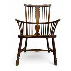 Early-to-mid 19th century elm and ash high-back Windsor armchair, central vase-shaped splat flanked by slender vertical spindles, outward-curving arms, shaped and dished saddle seat, raised on turned and splayed supports united by H-stretcher