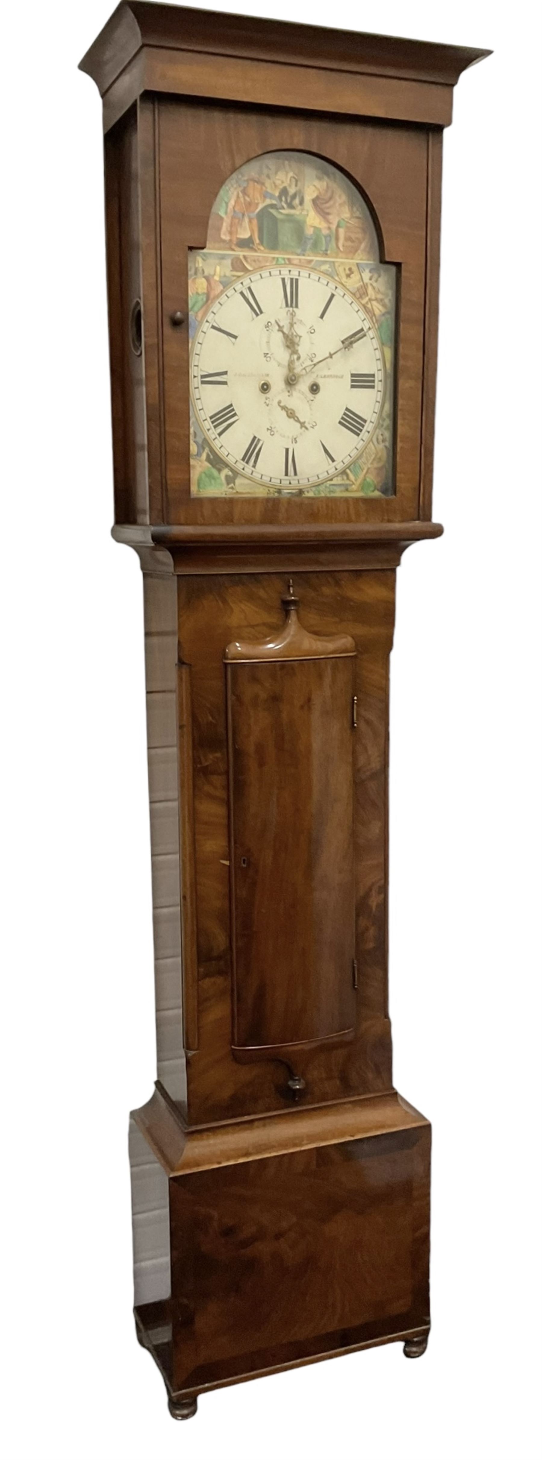 John Cameron & Son of Kilmarnock - late 19th century mahogany longcase clock c1870, with a flat topped pediment and blind frieze beneath, rectangular break arch hood door and sound frets to the hood sides, trunk with canted corners and a convex door with cushion mouldings, on a square plinth raised on turned bun feet, painted dial with a depiction of the abdication of Mary Queen of Scots to the arch and the four regions of the united Kingdom to the spandrels, with Roman numerals, minute track, date and seconds dials and stamped brass hands, dial pinned to a rack striking movement, striking the hours on a bell. With weights and pendulum. 