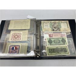 World banknotes, including Queen Elizabeth II The States of Jersey one pound 'DB202703', five pounds 'BB527762' and ten pounds 'AB651481', reserve bank of New Zealand two dollars '1L3 741894', King George V Straits Settlements one dollar 1st January 1935 'F/83 28924', various Bank of England notes etc, housed in two ring binder albums
