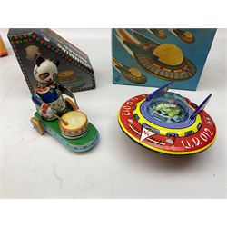 Seven modern Chinese, Japanese and Continental boxed tin-plate toys including Ucan Daire Flying Saucer, Drumming Animal, Circus Clown, Puzzle Cat, Bird with Jumping Action etc; and a quantity of clockwork toy keys (7)
