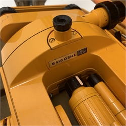 Carl Zeiss Theo 015B orange painted theodolite serial no.251267 in fitted case with accessories; E.R. Watts & Sons London level with black crackled body, serial no.1888, in calf leather carrying case; wooden folding tripod and telescopic measuring staff (4)