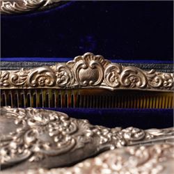 Victorian silver backed six piece dressing table set  with embossed decoration and engraved with initials in original case Chester 1900 Maker Charles Cooke