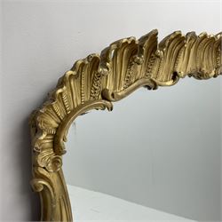 Large Victorian gilt wood and gesso overmantel mirror, carved and pierced scallop top, the frame decorated with scrolling foliage, acanthus c-scroll brackets with flower heads