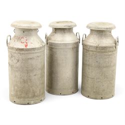 20th century aluminium set of three milk churns, with handles, baring the stamps of 'Middl...