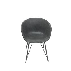 Bucket chair upholstered in stone grey fabric on outsplayed supports