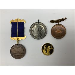 Wilberforce and the Slave Trade silver gilt medallion. First edition No.369; Hull Times bronze Long Service Medal; Hull Education Committee bronze school attendance medal; and a silvered medallion to Commemorate Queen Victoria's Visit to Hull Oct.14 1854; all uncased (4)
