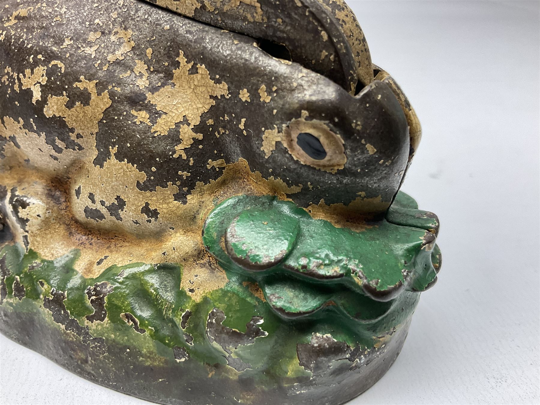 Two early 20th century cast-iron mechanical money banks - 'Rabbit on Cabbage' by Kilgore Manufacturing Company c1921 L11cm; and 'Elephant Swings Trunk' by A C Williams & Co patented 27th June 1905 L12.5cm (2)