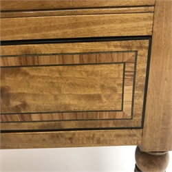 Gotts of Pickering inlaid satinwood Canterbury, four sections with pierced handle, single lined drawer, brass capped turned supports on castors, W53cm, H54cm, D31cm