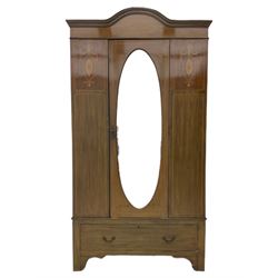Edwardian inlaid mahogany wardrobe, arched pediment over oval mirror door, drawer to base