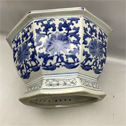 Early 20th century Chinese blue and white footed planter of octagonal form with stylised floral decoration and pierced base, D40cm H24cm