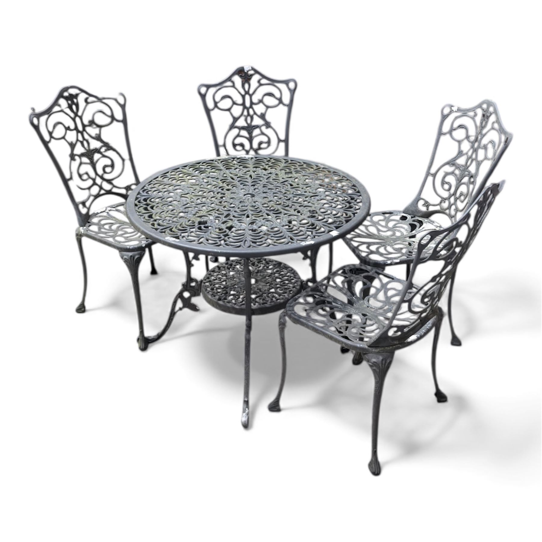 Cast aluminium garden table and four chairs in dark grey