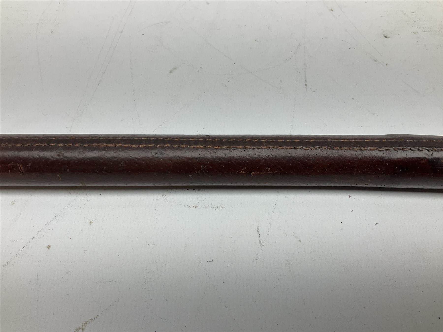Early 20th century officer's swagger type leather covered sword stick, the 33cm etched single fullered blade marked Wilkinson Pall Mall, with carrying strap L60.5cm