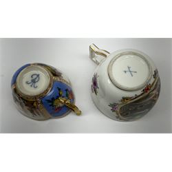 A 19th century Helena Wolfsohn Augustus Rex mark cup and saucer, of quatrefoil form, the cup painted with panels of flowers and waterside views, the saucer with flowers and courting couples, each heightened in gilt, each with painted mark beneath, cup H4.5cm, cup L13cm, together with a Continental cup and saucer, the cup painted with a panel of a figure with stargazing, the saucer with figures hunting, each further detailed with floral sprays and sprigs and heightened in gilt, each with painted blue crossed sword type mark beneath, cup H6cm, saucer L14cm. (2).  