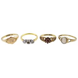 18ct gold two stone diamond ring, stamped and three 9ct gold rings including garnet cluster, opal and heart signet, hallmarked