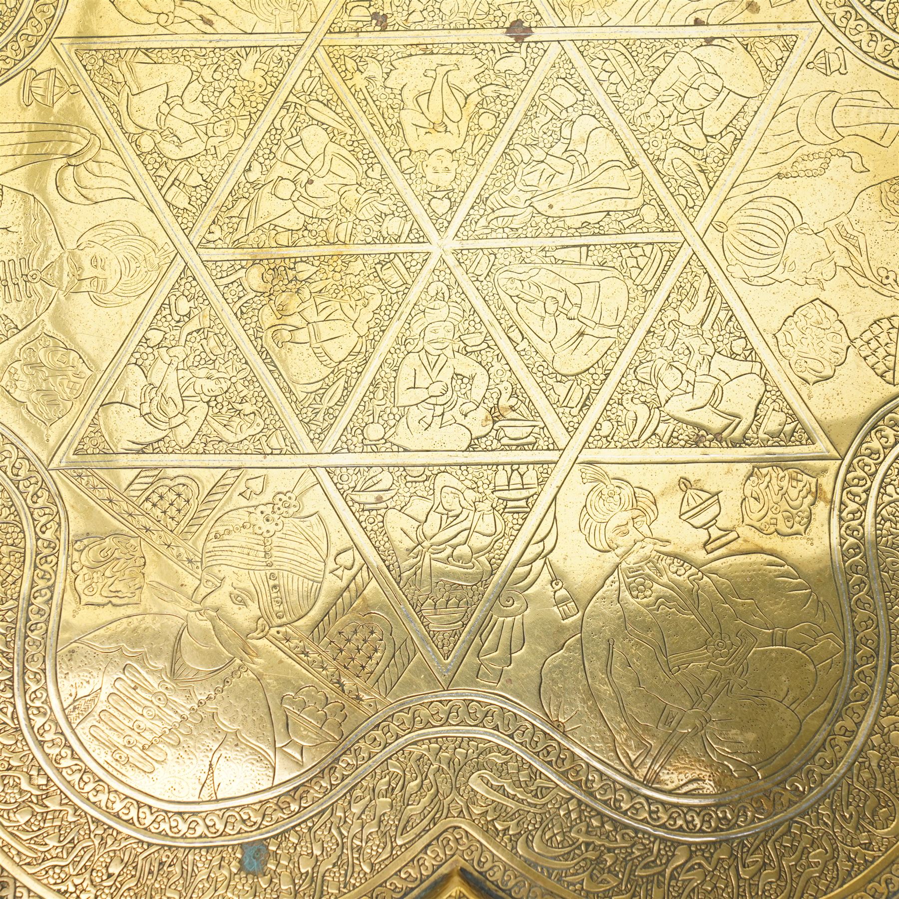 Middle Eastern brass tray, decorated with panels of Maharajas, bordered with repeating patterns, symbols and script, D39cm 