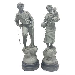 Pair of 20th Century spelter figures modelled as a Fisherman and Fisher's Wife, each mounted to a fixed stepped circular base, H60cm