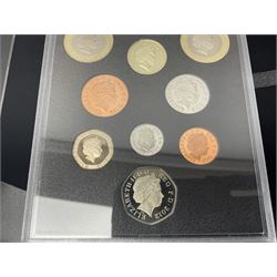 Mostly commemorative coinage, including various Queen Elizabeth II United Kingdom brilliant uncirculated fifty pence, two pound and five pound coins in card folders, The Royal Mint United Kingdom 2012 proof coin set, Alderney 2021 'Royal National Lifeboat Institution' five pound coin cover in Harrington and Byrne folder etc