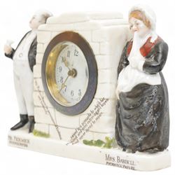 Late 19th century -  'The Pickwick Papers' novelty mantle clock, with flanking figures 'Mr Pickwick' and 'Mrs Bardell', 30 hour spring driven timepiece movement with a pin pallet escapement, wound and set from the rear, H11cm