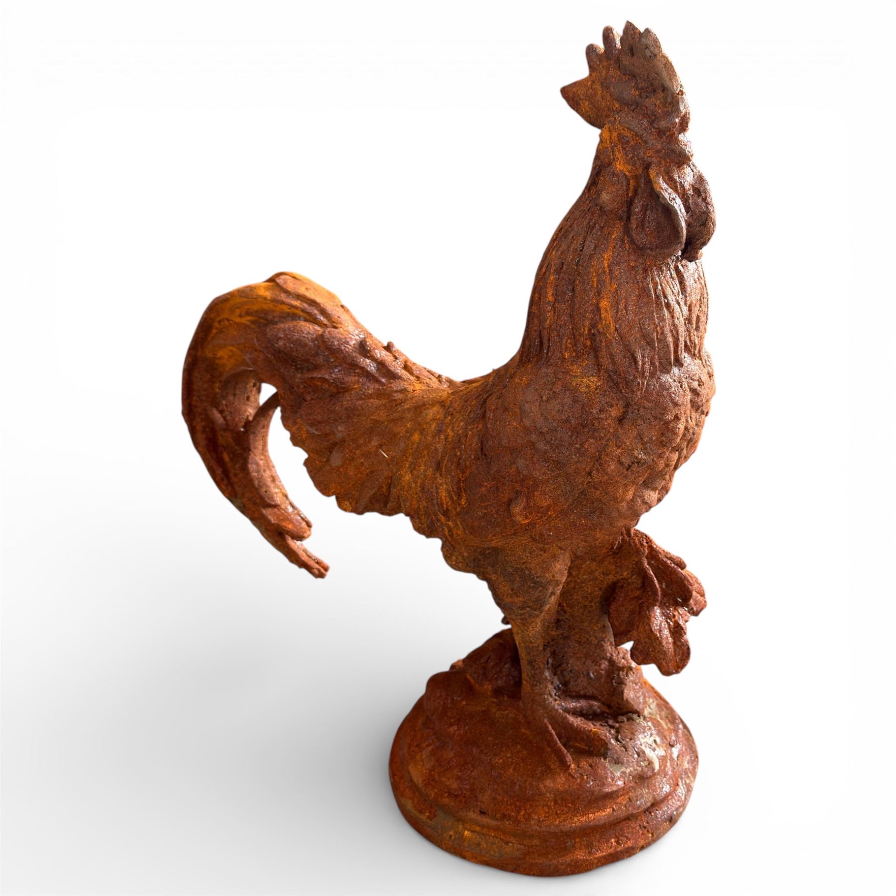 Small cast iron cockerell, on circular base