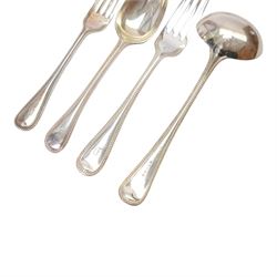 Oak table top canteen cabinet, the top with inset vacant brass cartouche, with pair of panelled doors opening to reveal four interior drawers with inset brass handle, containing a selection of silver plated flatware, 29cm x 40cm x 51cm