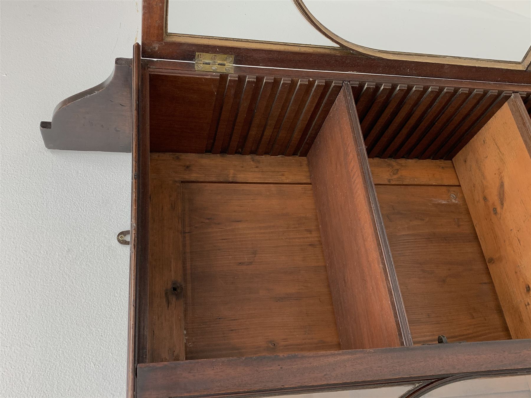Georgian mahogany Gothic wall hanging cabinet, enclosed by two ogee pointed arch astragal glazed doors, plain sides with shaped top and bottom brackets