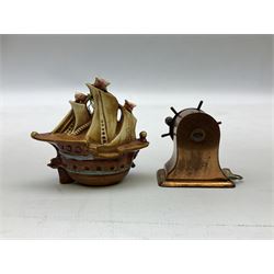 Copper tape measure in the form of a ship`s wheel, marked 'Rd. 128885' to the front, and a celluloid tape measure in the form of a galleon, wheel H4cm