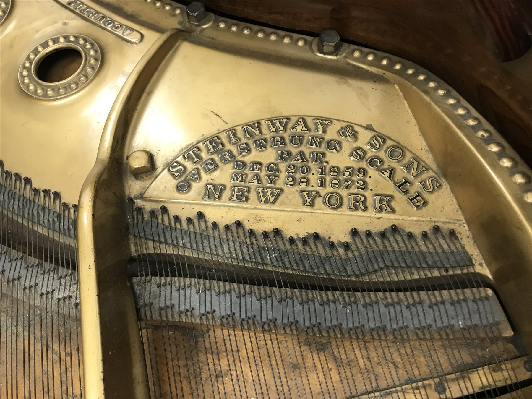 Steinway & Sons - Victorian rosewood cased grand piano, model 'O', iron framed and overstrung, serial no. '93958', circa. 1897, pierced scrolling music rest, turned and fluted supports with recessed castors, L187cm, W143cm, H99cm 