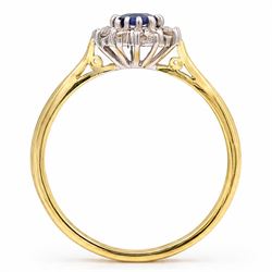 18ct gold sapphire and diamond cluster ring, single oval cut sapphire of approx 0.45 carat, surrounded by twelve round brilliant cut diamonds, London 1998, total diamond weight approx 0.25 carat