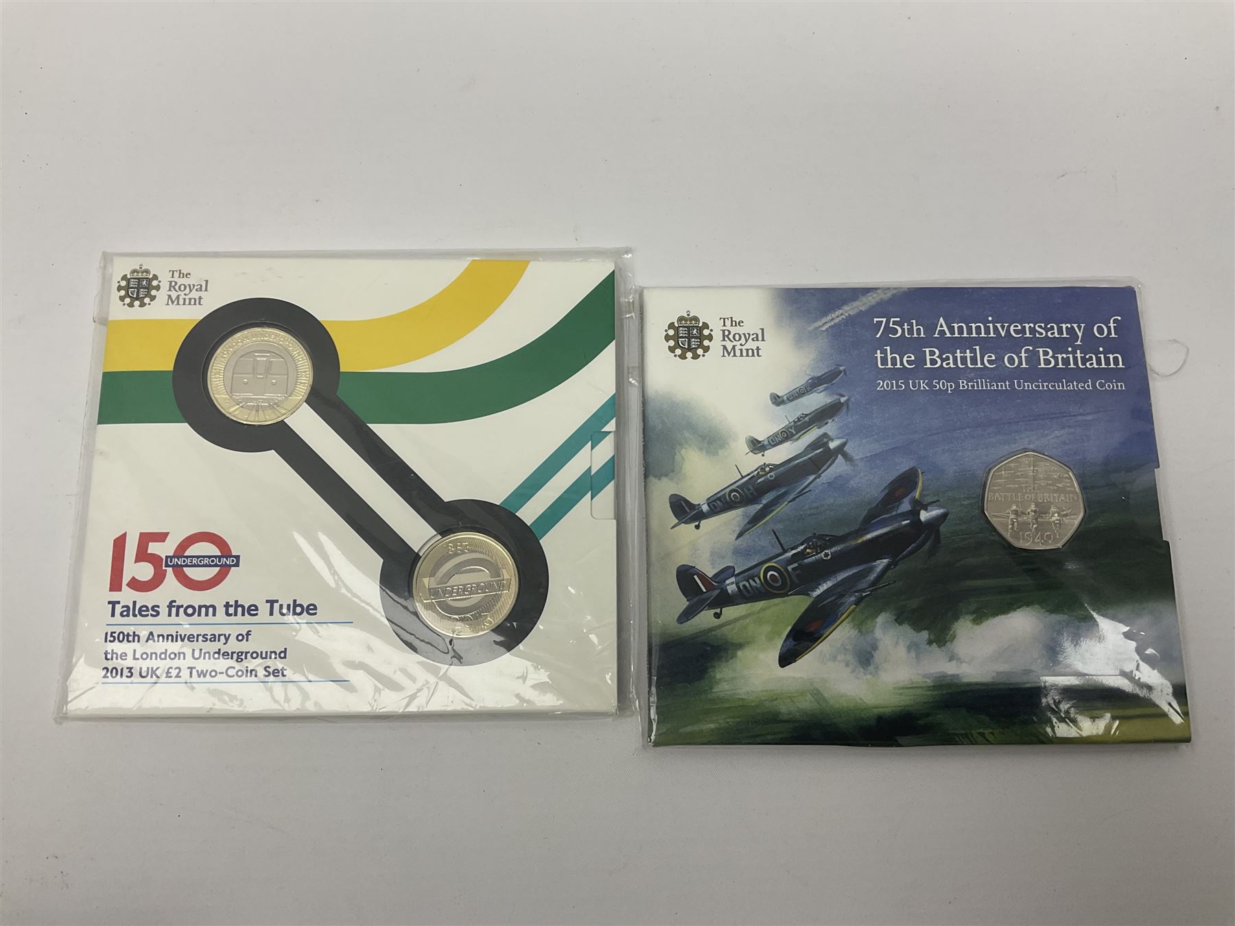 Mostly commemorative coinage, including various Queen Elizabeth II United Kingdom brilliant uncirculated fifty pence, two pound and five pound coins in card folders, The Royal Mint United Kingdom 2012 proof coin set, Alderney 2021 'Royal National Lifeboat Institution' five pound coin cover in Harrington and Byrne folder etc