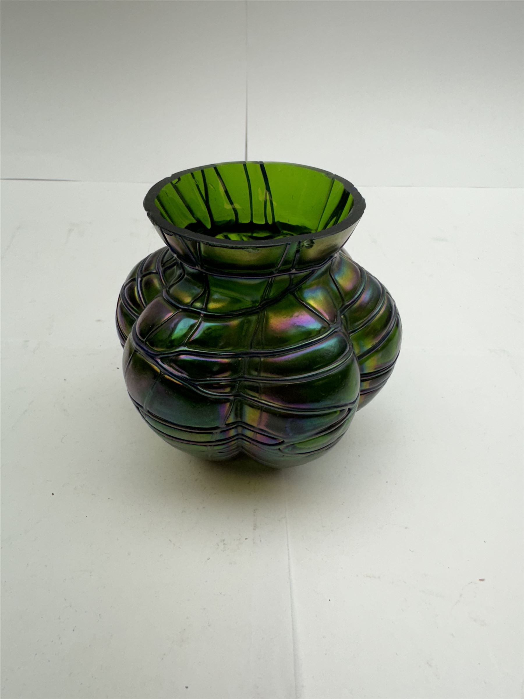 Three Austrian Art Nouveau Kralik iridescent glass vases, to include two of squat baluster form and a taller example, all green with threaded vein decoration to body, tallest H13.5cm