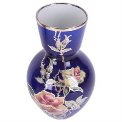 Heinrich vase with silver overlay depicting figures in period dress upon a cobalt blue ground, together with German vase with floral decoration and silver overlay, largest H21cm 
