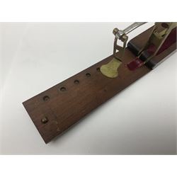 Brass sovereign scales and a part set of Georgian folding sovereign scales (one weight missing)