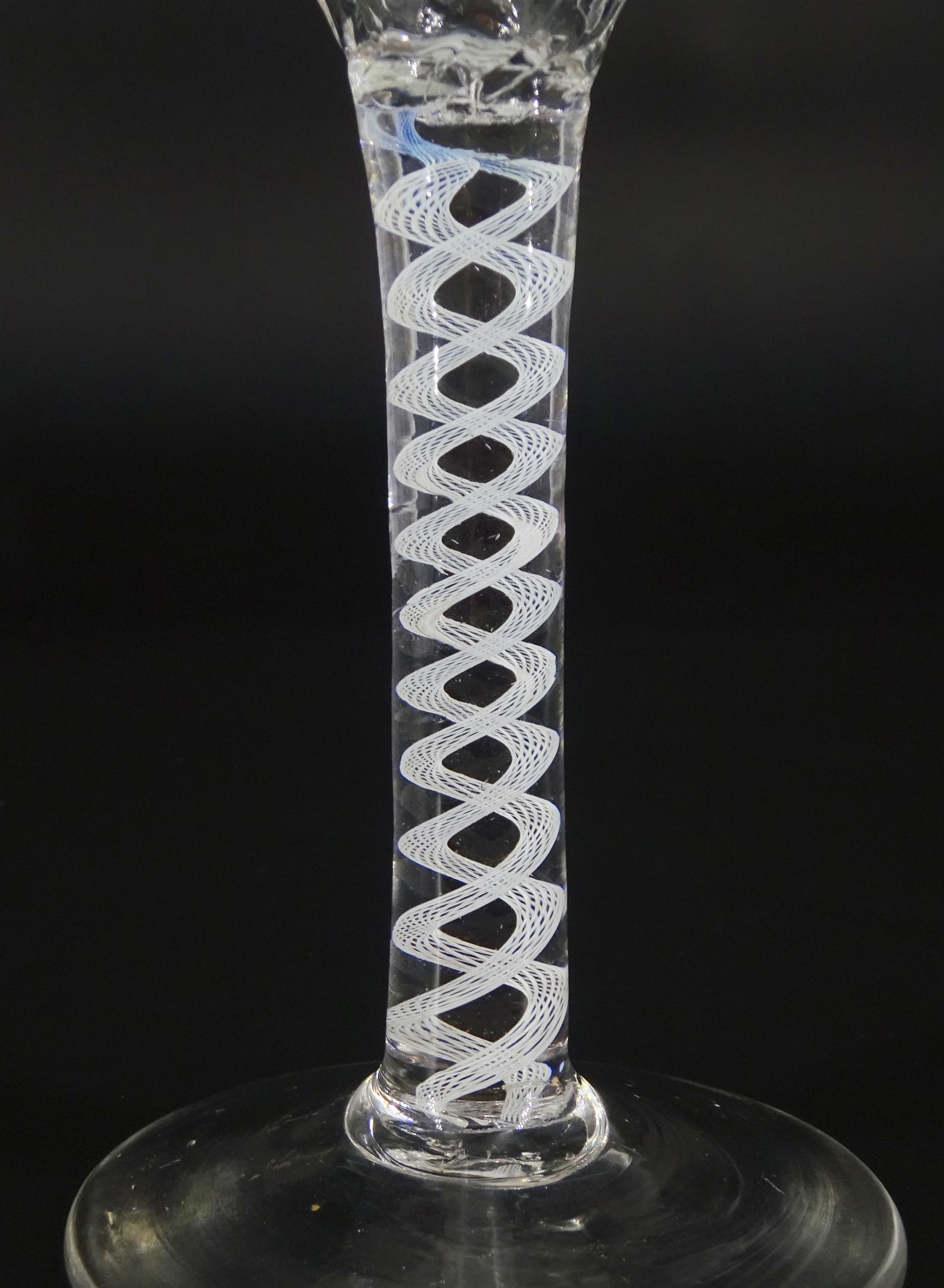 18th century drinking glass, the ogee part honeycomb moulded bowl upon a single series opaque twist stem and conical foot, H14.5cm