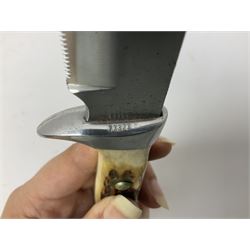 German Original Puma-Bowie knife, with maker's name and number 6396 to the 16.5cm blade, stamped number 73373 to the guard, antler grip, in original hard plastic case with brown leather sheath, also marked Puma