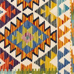 Two Chobi flatweave kilims with a repeating stepped diamond medallion design in live green, rust, teal, purple, and ivory, framed by chevron and geometric borders, 121x80cm & 87x60cm 