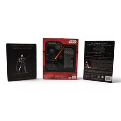 Three Star Wars models, comprising Master Replicas A New Hope Wedge Antilles X-Wing Pilot Helmet scale replica, Gentle Giant Darth Malgus Statue and a Disney Store limited edition Kylo Ren figurine, all boxed 