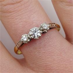 Gold three stone old cut diamond ring, stamped 18ct plat