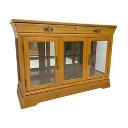 Yew wood sideboard, rectangular top with mahogany and ebony stringing, fitted with two drawers over three glazed cupboard doors enclosing glass shelves