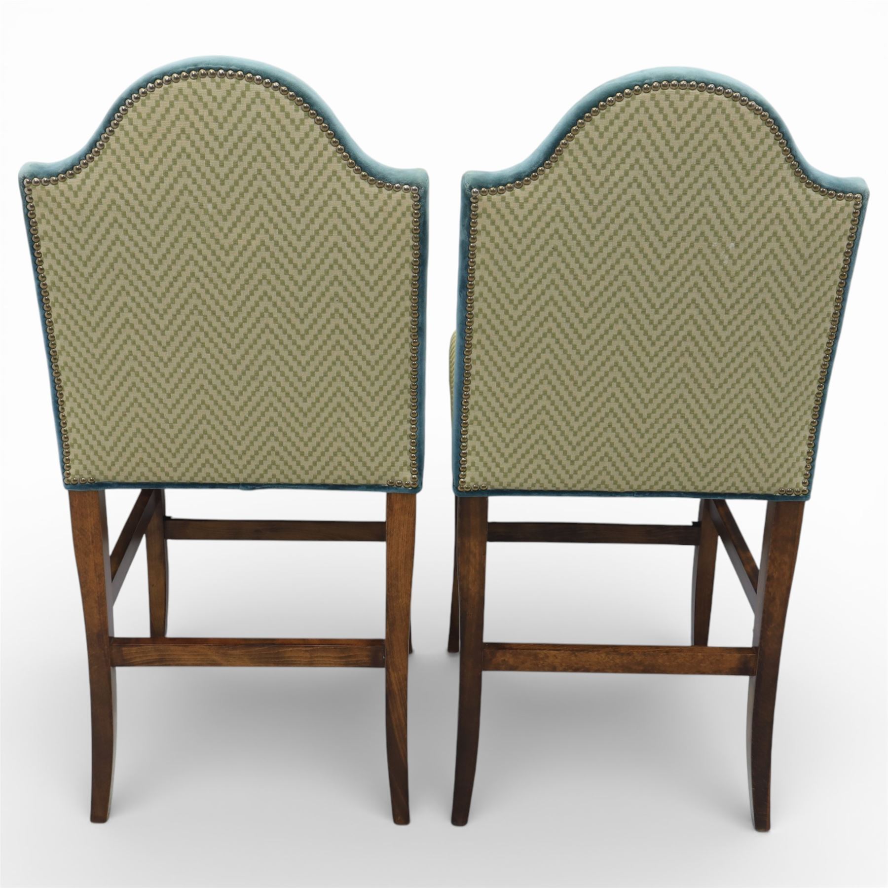 Pair of padded back high seat bar stools, upholstered in cream chevron fabric with green velvet trim 
