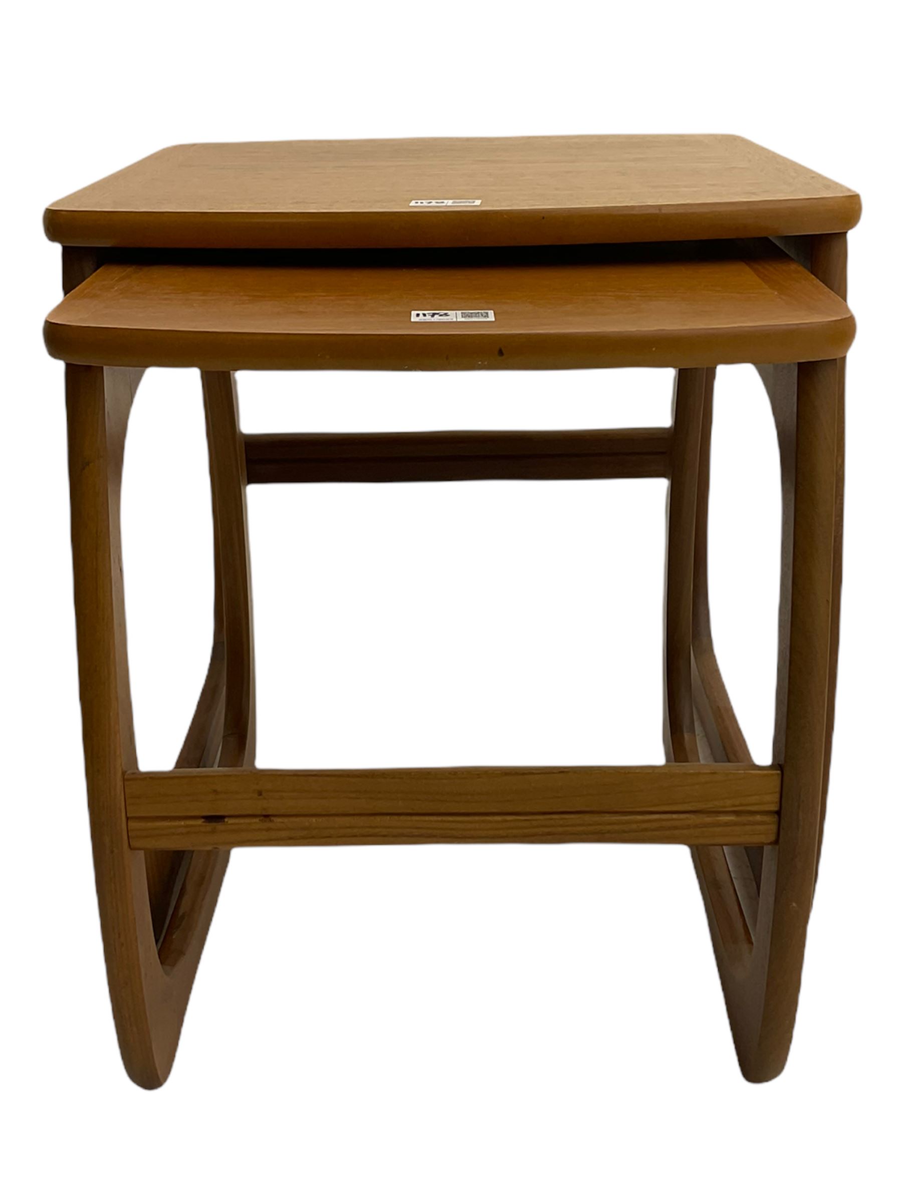 Nathan - teak Long John nest of tables and a singular nest of tables 