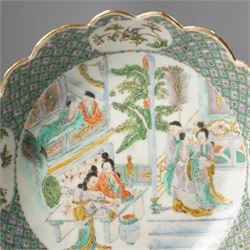 Chinese Kangxi period famille verte bowl, painted with seven figures in a pavilion interior, in Cantonese style border with foliate rim, the exterior painted with similar scenes, D24cm