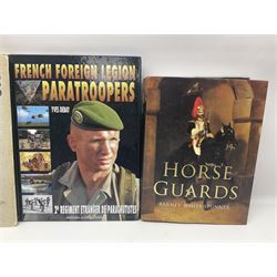Seven military reference books - Histoire Mondiale Des Parachutistes; Yves Debay: French Foreign Legion  Paratroopers; Bragg & Turner: Parachute Wings; Barney White-Turner: Horse Guards; and three works on uniforms/standards (7)