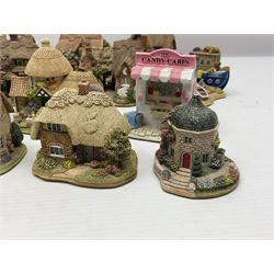 Eighteen Lilliput Lanes, including The Penny Farthing, The Pigsty, Borrowdale School, Fairy Cake Tearoom, An Apple a Day,Ladybird Cottage etc, all with original boxes 