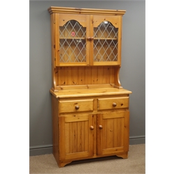  Pine farmhouse dresser, raised lead glazed display cabinets, two drawers and panelled cupboard, W92cm, H180cm, D43cm  