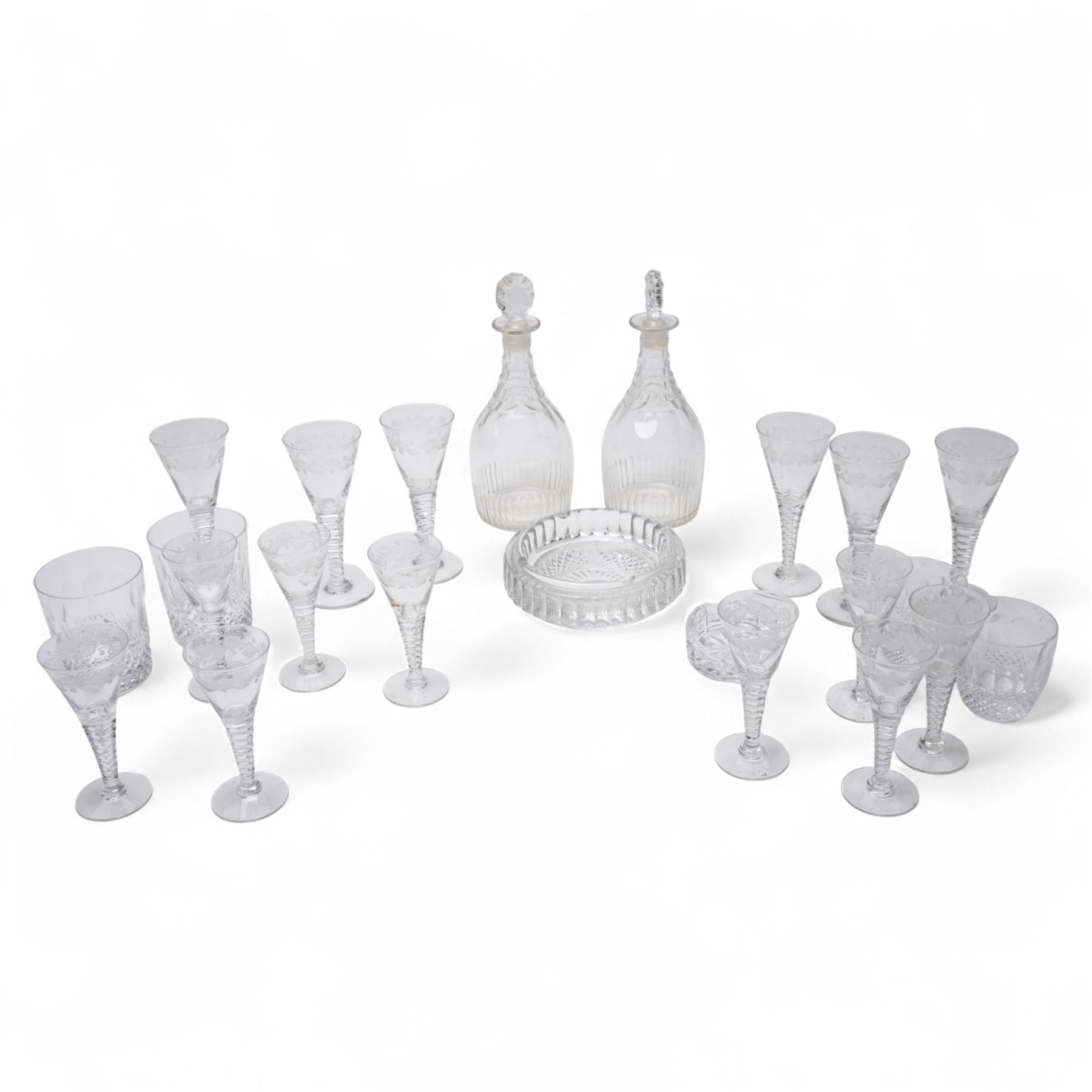 *Set of six Stuart crystal wine glasses with leaf etched decoration and cut tapering stems, nine smaller matching glasses, pair of Waterford Colleen tumblers, pair of smaller tumblers, pair of glass decanters and two glass ashtraysFrom the Kirkham Hall Attic & Cellar Collection, sold without reserve